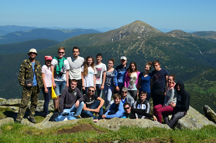 team on a mountain | Swan Software Solutions